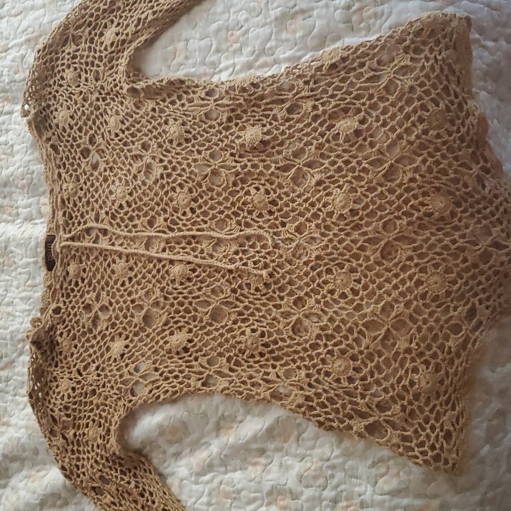 Nude knitted cover up top. Size Large